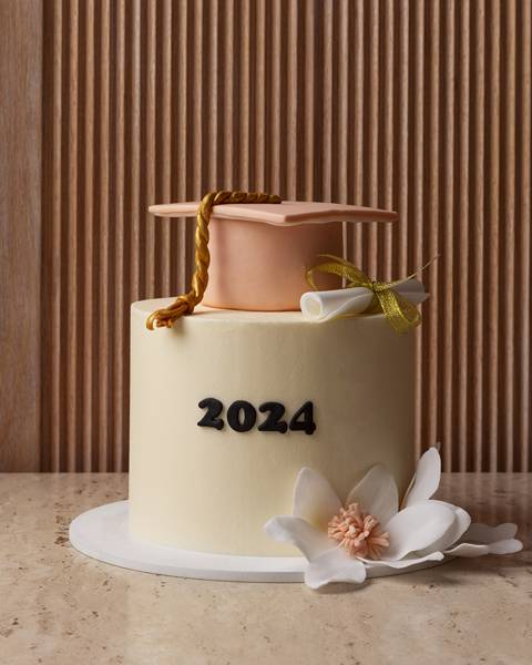Graduation Cake 2024 with Peach Cap