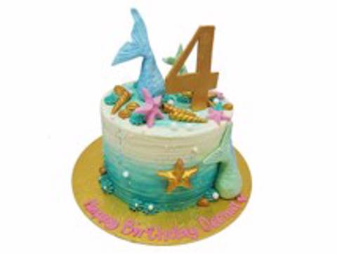 كيكة حورية البحر بصدفة ذهبية