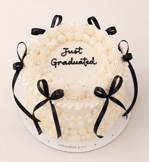 White Graduation Cake with Bow